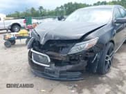 ✅ 2013 Lincoln MKS • VIN: 1LNHL9EK8DG618023 • Lot: 42959218. Wystawiony na IAAI z przebiegiem 113 057 mil. Bezpłatny archiwum sprzedaży aukcyjnych z USA i szczegółowy raport historii pojazdu na DreamBid. Zdjęcie 6.