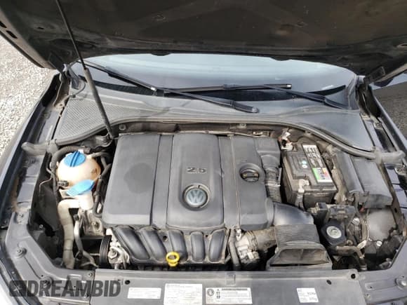 ✅ 2014 Volkswagen Passat Wolfsburg Edition • VIN: 1VWAH7A32EC021160 • Лот: 52740025. Опубликован ранее на Copart с пробегом 158 068 миль. Бесплатный доступ к архиву аукционных продаж из США и подробный отчёт об истории автомобиля на DreamBid. Изображение 11.