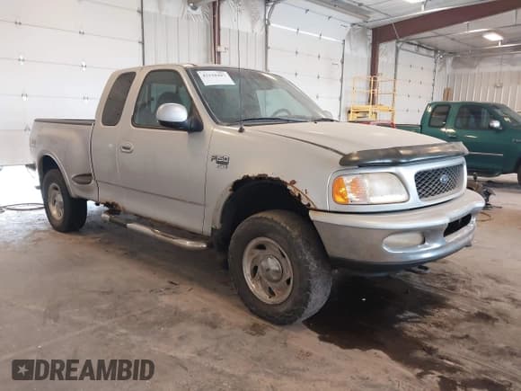✅ 1998 Ford F-150 XL • VIN: 2FTRX08L1WCA04612 • Lot: 42518487. Listed on IAAI with 173,286 mi. Free auction sales archive from the USA and detailed vehicle history report at DreamBid. Image 1.