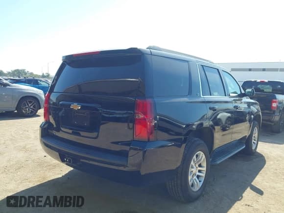 ✅ 2020 Chevrolet Tahoe LT • VIN: 1GNSKBKC5LR121183 • Lot: 43394920. Listed on IAAI with 140,841 mi. Free auction sales archive from the USA and detailed vehicle history report at DreamBid. Image 4.