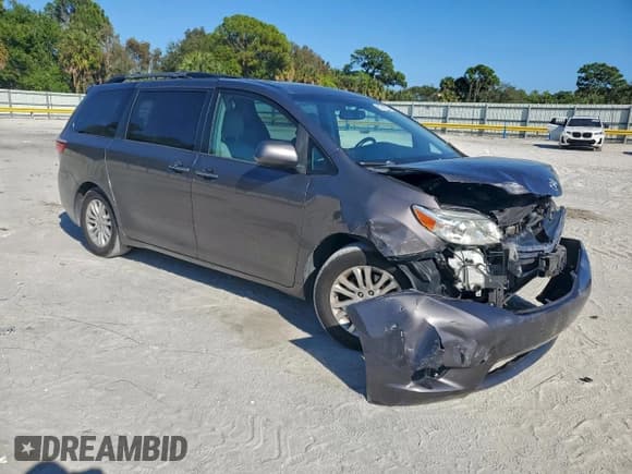 ✅ 2015 Toyota Sienna XLE • VIN: 5TDYK3DC0FS678921 • Lot: 94314055. Listed on Copart with 112,858 mi. Free auction sales archive from the USA and detailed vehicle history report at DreamBid. Image 4.