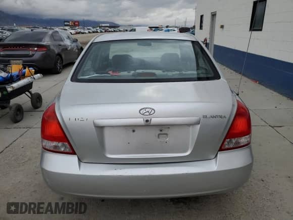 2003 Hyundai Elantra GLS z VIN KMHDN45D63U621502, wystawiony jako Copart lot #78417154 z przebiegiem 202 917 mil mil oraz Czysty tytuł • Clean title. Historia ofert i sprzedaży dostępna na DreamBid. Obrazek 6.