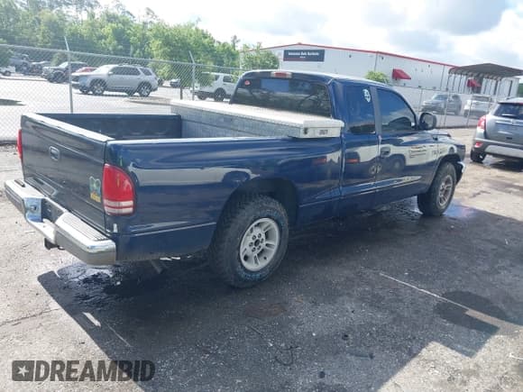 ✅ 2000 Dodge Dakota • VIN: 1B7GL22X3YS523895 • Lot: 42247540. Wystawiony na IAAI z przebiegiem 159 138 mil. Bezpłatny archiwum sprzedaży aukcyjnych z USA i szczegółowy raport historii pojazdu na DreamBid. Zdjęcie 4.