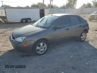 ✅ 2006 Ford Focus S • VIN: 1FAFP34N76W126588 • Lot: 82662405. Listed on Copart with 105,514 mi. Free auction sales archive from the USA and detailed vehicle history report at DreamBid. Image 1.