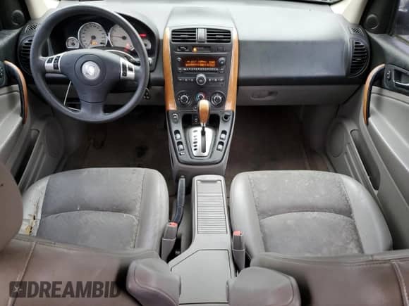 2007 Saturn VUE V6 z VIN 5GZCZ634X7S805568, wystawiony jako Copart lot #87123904 z przebiegiem 162 578 mil mil oraz Szkoda całkowita • Salvage title. Historia ofert i sprzedaży dostępna na DreamBid. Obrazek 8.