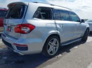 ✅ 2015 Mercedes-Benz GL 550 • VIN: 4JGDF7DE0FA472857 • Лот: 42309286. Опубликован ранее на IAAI с пробегом 93 088 миль. Бесплатный доступ к архиву аукционных продаж из США и подробный отчёт об истории автомобиля на DreamBid. Изображение 4.