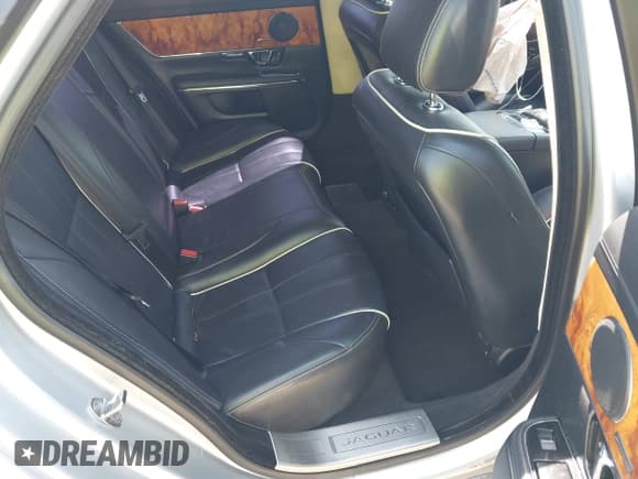 ✅ 2014 Jaguar XJ • VIN: SAJWA1CZXE8V59430 • Лот: 42252069. Опубликован ранее на IAAI с пробегом 87 150 миль. Бесплатный доступ к архиву аукционных продаж из США и подробный отчёт об истории автомобиля на DreamBid. Изображение 8.