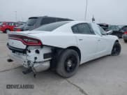 ✅ 2019 Dodge Charger Police • VIN: 2C3CDXAG4KH645064 • Lot: 39336933. Listed on IAAI with 37,395 mi. Free auction sales archive from the USA and detailed vehicle history report at DreamBid. Image 4.