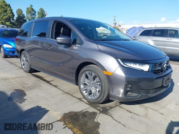 ✅ 2026 Honda Odyssey Touring • VIN: 5FNRL6H86TB015099 • Lot: 43633848. Listed on IAAI with 897 mi. Free auction sales archive from the USA and detailed vehicle history report at DreamBid. Image 1.