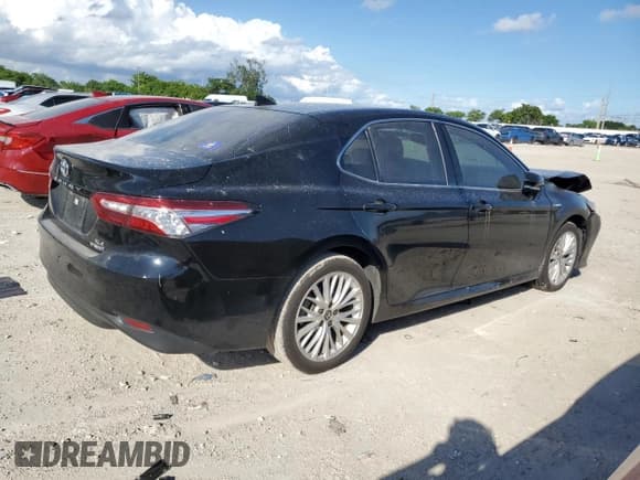 ✅ 2020 Toyota Camry Hybrid XLE • VIN: 4T1F31AKXLU537474 • Lot: 86223095. Listed on Copart with 84,292 mi. Free auction sales archive from the USA and detailed vehicle history report at DreamBid. Image 3.