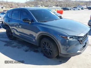 ✅ 2022 Mazda CX-5 S Carbon Edition • VIN: JM3KFBCMXN1619568 • Lot: 41828567. Listed on IAAI with 41,475 mi. Free auction sales archive from the USA and detailed vehicle history report at DreamBid. Image 1.