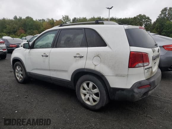✅ 2013 Kia Sorento LX • VIN: 5XYKTDA66DG418430 • Lot: 84237585. Listed on Copart with 137,683 mi. Free auction sales archive from the USA and detailed vehicle history report at DreamBid. Image 2.