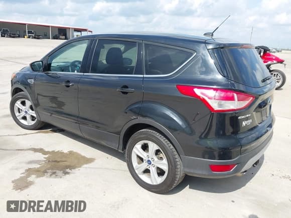 ✅ 2015 Ford Escape SE • VIN: 1FMCU0G91FUB32395 • Lot: 43521911. Listed on IAAI with 84,750 mi. Free auction sales archive from the USA and detailed vehicle history report at DreamBid. Image 3.