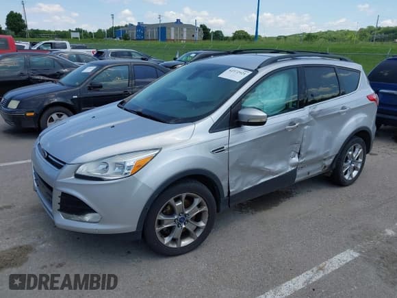 ✅ 2013 Ford Escape SEL • VIN: 1FMCU0H97DUC70437 • Lot: 42372921. Wystawiony na IAAI z przebiegiem 193 069 mil. Bezpłatny archiwum sprzedaży aukcyjnych z USA i szczegółowy raport historii pojazdu na DreamBid. Zdjęcie 2.