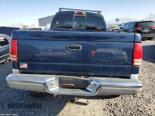 ✅ 2002 Dodge Dakota SLT • VIN: 1B7HG48N22S646167 • Lot: 42716735. Wystawiony na Copart z przebiegiem 184 598 mil. Bezpłatny archiwum sprzedaży aukcyjnych z USA i szczegółowy raport historii pojazdu na DreamBid. Zdjęcie 6.