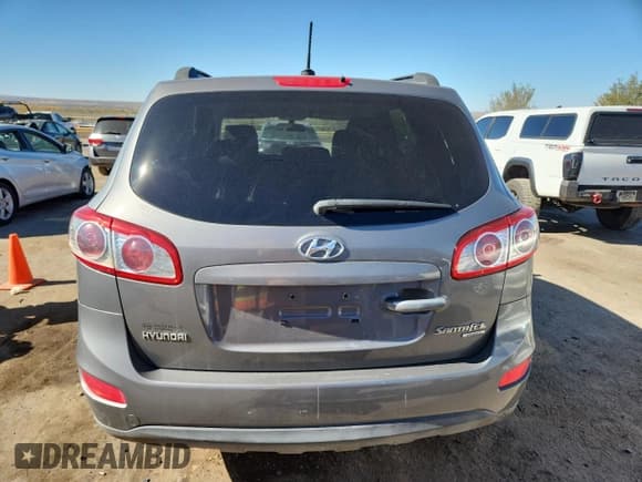 ✅ 2010 Hyundai Santa Fe GLS • VIN: 5NMSGDAB5AH375279 • Lot: 92054145. Listed on Copart with 161,557 mi. Free auction sales archive from the USA and detailed vehicle history report at DreamBid. Image 6.
