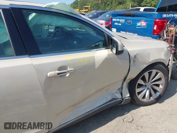 ✅ 2016 Lincoln MKS • VIN: 1LNHL9EK0GG600054 • Lot: 42954183. Listed on IAAI with 102,386 mi. Free auction sales archive from the USA and detailed vehicle history report at DreamBid. Image 6.