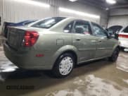 ✅ 2004 Suzuki Forenza S • VIN: KL5JD52Z14K975804 • Lot: 43227455. Listed on Copart with 114,726 mi. Free auction sales archive from the USA and detailed vehicle history report at DreamBid. Image 3.