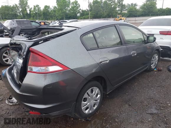 ✅ 2014 Honda Insight LX • VIN: JHMZE2H54ES000081 • Lot: 42622054. Listed on IAAI with 30,097 mi. Free auction sales archive from the USA and detailed vehicle history report at DreamBid. Image 4.