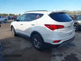 2018 Hyundai Santa Fe 2.4L z VIN 5NMZUDLB1JH097002, wystawiony jako IAAI lot #43473652 z przebiegiem 182 069 mil mil oraz . Historia ofert i sprzedaży dostępna na DreamBid. Obrazek 3.