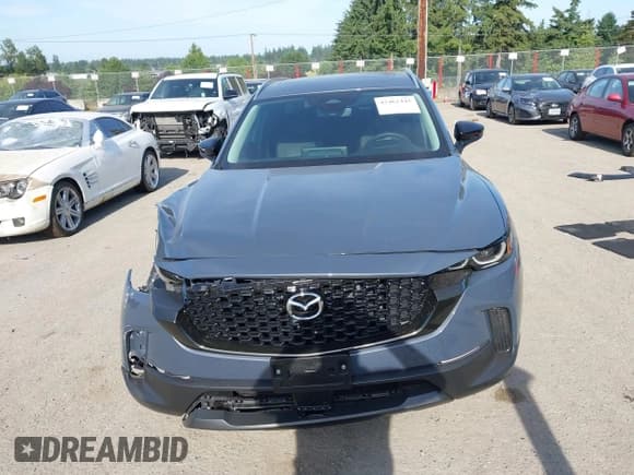 ✅ 2025 Mazda CX-50 S Premium Plus • VIN: 7MMVABEM2SN332649 • Лот: 42462445. Опубликован ранее на IAAI с пробегом 4 472 миль. Бесплатный доступ к архиву аукционных продаж из США и подробный отчёт об истории автомобиля на DreamBid. Изображение 13.