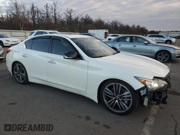 ✅ 2015 Infiniti Q50 • VIN: JN1BV7AP2FM337658 • Lot: 93303885. Listed on Copart with 138,087 mi. Free auction sales archive from the USA and detailed vehicle history report at DreamBid. Image 4.