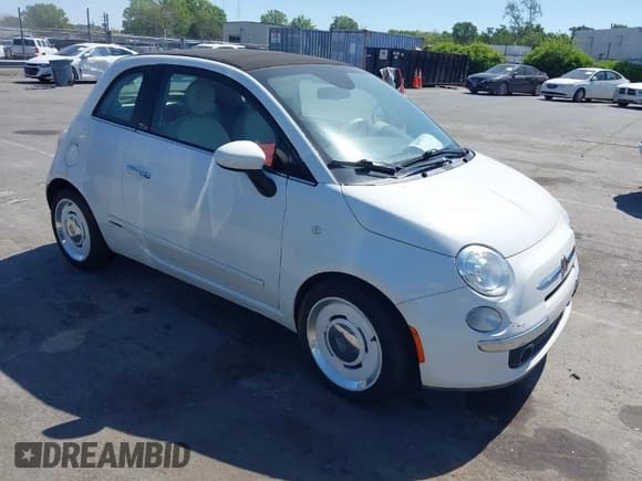 ✅ 2015 FIAT 500 Lounge • VIN: 3C3CFFER9FT716644 • Lot: 42059173. Listed on IAAI with 69,982 mi. Free auction sales archive from the USA and detailed vehicle history report at DreamBid. Image 1.