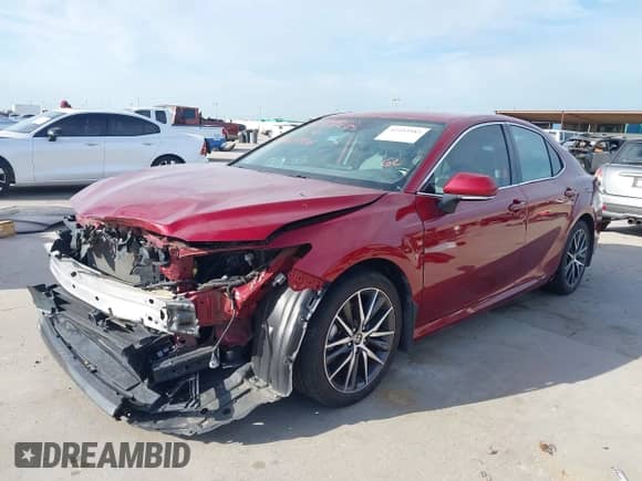 2022 Toyota Camry Hybrid XLE with VIN 4T1F31AK3NU573039, listed as a IAAI auction lot 42593982 with 39,779 mi miles and . Bid and sale history available at DreamBid. Image 2.