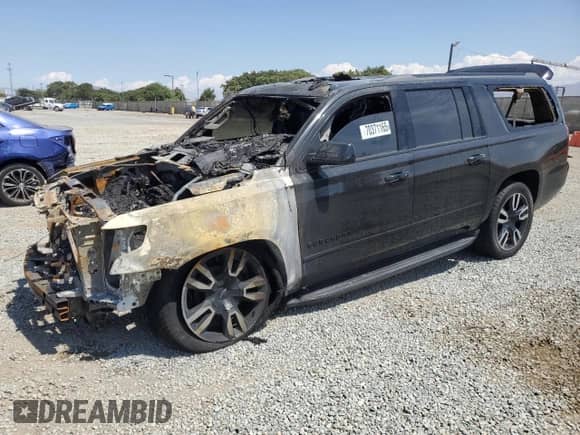 2020 Chevrolet Suburban Premier с VIN 1GNSCJKC4LR274399, выставлен на аукционе Copart как лот 70371165 с пробегом Не указан миль и На запчасти • Non repairable. История ставок и продаж доступна на DreamBid. Изображение 1.