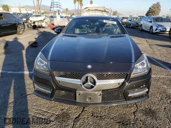 ✅ 2015 Mercedes-Benz SLK 350 • VIN: WDDPK5HA4FF100858 • Lot: 80667864. Wystawiony na Copart z przebiegiem 101 052 mil. Bezpłatny archiwum sprzedaży aukcyjnych z USA i szczegółowy raport historii pojazdu na DreamBid. Zdjęcie 5.
