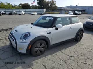 2023 MINI Hardtop Cooper SE with VIN WMW13DJ03P2T47240, listed as a Copart auction lot 53159975 with 23,480 mi miles and Salvage title. Bid and sale history available at DreamBid. Image 1.