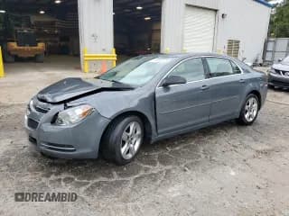 ✅ 2009 Chevrolet Malibu 1LS • VIN: 1G1ZG57BX9F153818 • Lot: 71530624. Listed on Copart with 165,272 mi. Free auction sales archive from the USA and detailed vehicle history report at DreamBid. Image 1.