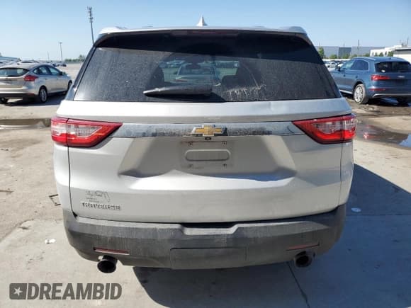 ✅ 2020 Chevrolet Traverse LS • VIN: 1GNERFKW5LJ299474 • Lot: 53428605. Listed on Copart with 100,478 mi. Free auction sales archive from the USA and detailed vehicle history report at DreamBid. Image 6.