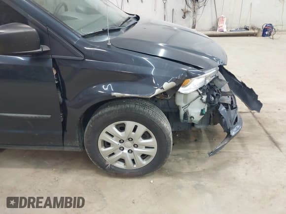 ✅ 2014 Dodge Grand Caravan American Value • VIN: 2C4RDGBG5ER340529 • Lot: 43557201. Wystawiony na IAAI z przebiegiem 156 647 mil. Bezpłatny archiwum sprzedaży aukcyjnych z USA i szczegółowy raport historii pojazdu na DreamBid. Zdjęcie 17.