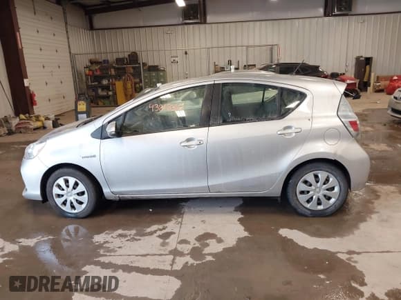 ✅ 2014 Toyota Prius Two • VIN: JTDKDTB37E1570181 • Lot: 43818310. Listed on IAAI with 155,531 mi. Free auction sales archive from the USA and detailed vehicle history report at DreamBid. Image 14.
