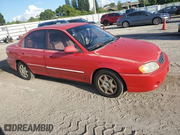 ✅ 2003 Kia Spectra • VIN: KNAFB121335255049 • Лот: 72218624. Опубликован ранее на Copart с пробегом 122 777 миль. Бесплатный доступ к архиву аукционных продаж из США и подробный отчёт об истории автомобиля на DreamBid. Изображение 4.