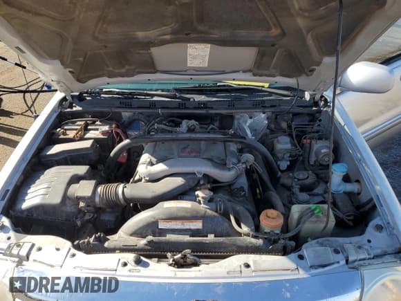 ✅ 2004 Suzuki XL7 LX • VIN: JS3TX92V944114570 • Lot: 73029184. Listed on Copart with 130,807 mi. Free auction sales archive from the USA and detailed vehicle history report at DreamBid. Image 12.