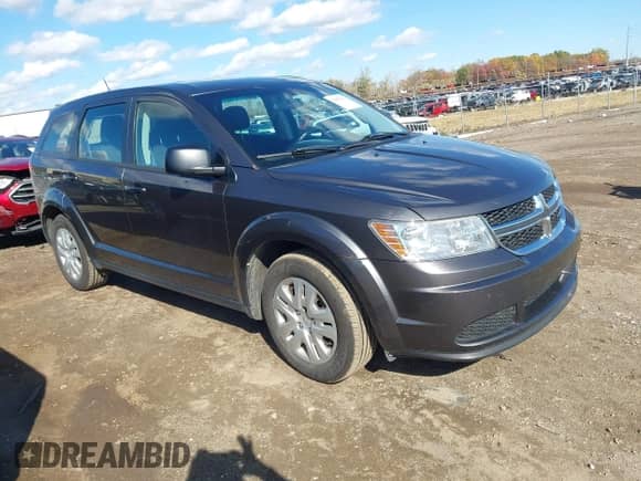 2015 Dodge Journey American Value z VIN 3C4PDCAB1FT637818, wystawiony jako IAAI lot #43497822 z przebiegiem 164 458 mil mil oraz . Historia ofert i sprzedaży dostępna na DreamBid. Obrazek 1.