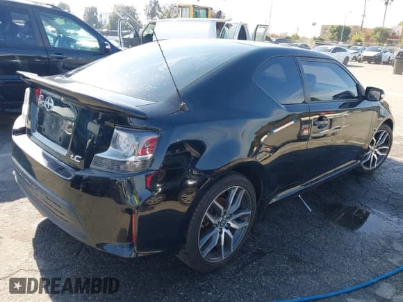 ✅ 2015 Scion tC • VIN: JTKJF5C71F3095337 • Lot: 43786433. Wystawiony na IAAI z przebiegiem 164 663 mil. Bezpłatny archiwum sprzedaży aukcyjnych z USA i szczegółowy raport historii pojazdu na DreamBid. Zdjęcie 4.