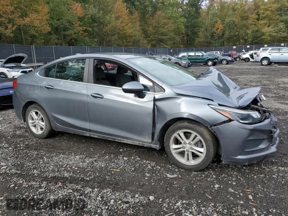 ✅ 2018 Chevrolet Cruze LT • VIN: 1G1BE5SM9J7142050 • Lot: 86644115. Listed on Copart with 94,262 mi. Free auction sales archive from the USA and detailed vehicle history report at DreamBid. Image 4.