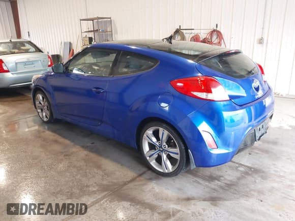 ✅ 2013 Hyundai Veloster w/Black Int • VIN: KMHTC6AD3DU176298 • Lot: 41515192. Wystawiony na IAAI z przebiegiem 99 401 mil. Bezpłatny archiwum sprzedaży aukcyjnych z USA i szczegółowy raport historii pojazdu na DreamBid. Zdjęcie 3.