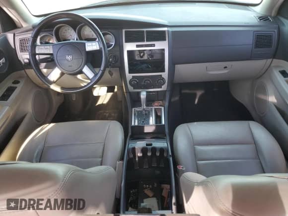 2006 Dodge Charger R/T with VIN 2B3KA53H76H521937, listed as a Copart auction lot 77455534 with 103,060 mi miles and Salvage title. Bid and sale history available at DreamBid. Image 8.