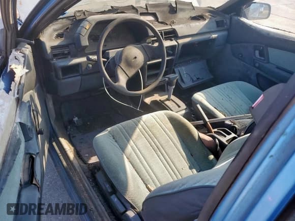 ✅ 1991 Plymouth Colt • VIN: JP3CU24A5MU016998 • Lot: 67751215. Wystawiony na Copart z przebiegiem 83 370 mil. Bezpłatny archiwum sprzedaży aukcyjnych z USA i szczegółowy raport historii pojazdu na DreamBid. Zdjęcie 8.