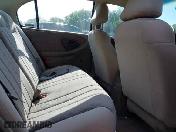 2000 Chevrolet Malibu z VIN 1G1ND52J1Y6294698, wystawiony jako IAAI lot #42342038 z przebiegiem 107 254 mil mil oraz . Historia ofert i sprzedaży dostępna na DreamBid. Obrazek 8.