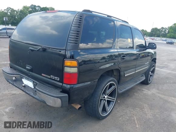 ✅ 2004 Chevrolet Tahoe LT • VIN: 1GNEC13Z74J198516 • Lot: 42815363. Listed on IAAI with Not provided. Free auction sales archive from the USA and detailed vehicle history report at DreamBid. Image 4.