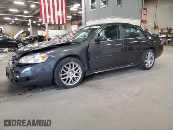 2016 Chevrolet Impala LTZ z VIN 2G1WC5E33G1126894, wystawiony jako Copart lot #80207675 z przebiegiem 207 044 mil mil oraz Szkoda całkowita • Salvage title. Historia ofert i sprzedaży dostępna na DreamBid. Obrazek 1.