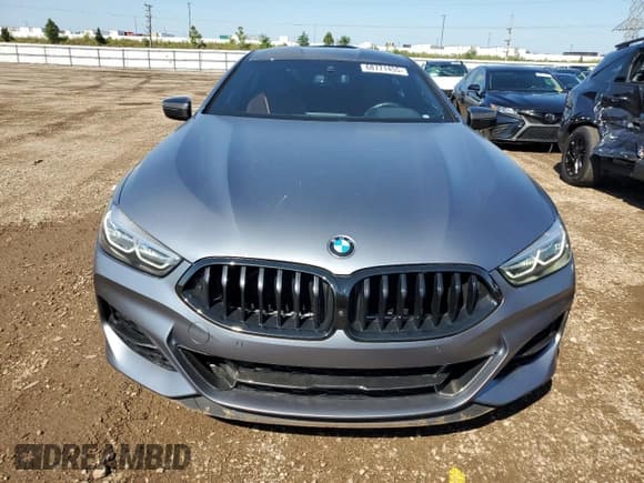 ✅ 2022 BMW 8 Series M850i • VIN: WBAGV8C05NCJ99138 • Лот: 68771455. Опубликован ранее на Copart с пробегом 32 313 миль. Бесплатный доступ к архиву аукционных продаж из США и подробный отчёт об истории автомобиля на DreamBid. Изображение 5.