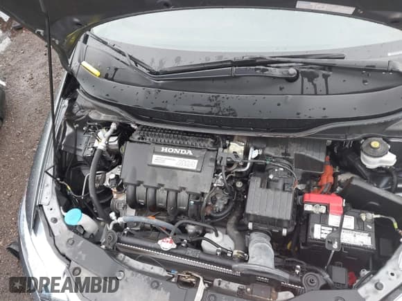 ✅ 2014 Honda Insight LX • VIN: JHMZE2H54ES000081 • Lot: 42622054. Listed on IAAI with 30,097 mi. Free auction sales archive from the USA and detailed vehicle history report at DreamBid. Image 10.