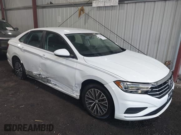 ✅ 2021 Volkswagen Jetta S • VIN: 3VWC57BU8MM015806 • Lot: 43260695. Wystawiony na IAAI z przebiegiem 77 027 mil. Bezpłatny archiwum sprzedaży aukcyjnych z USA i szczegółowy raport historii pojazdu na DreamBid. Zdjęcie 6.
