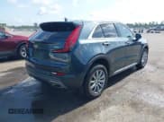 ✅ 2021 Cadillac XT4 FWD Premium Luxury • VIN: 1GYFZCR42MF007617 • Лот: 42437974. Опубликован ранее на IAAI с пробегом 126 071 миль. Бесплатный доступ к архиву аукционных продаж из США и подробный отчёт об истории автомобиля на DreamBid. Изображение 4.